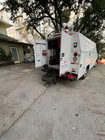 Magnet Plumbing service vehicle on-site for Grease Trap Cleaning in Coral Springs